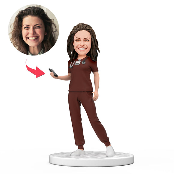 Personalized Female Doctor Bobblehead in Red Scrubs Holding a Mobile Phone with Engraved Text National Doctor's Day Gift