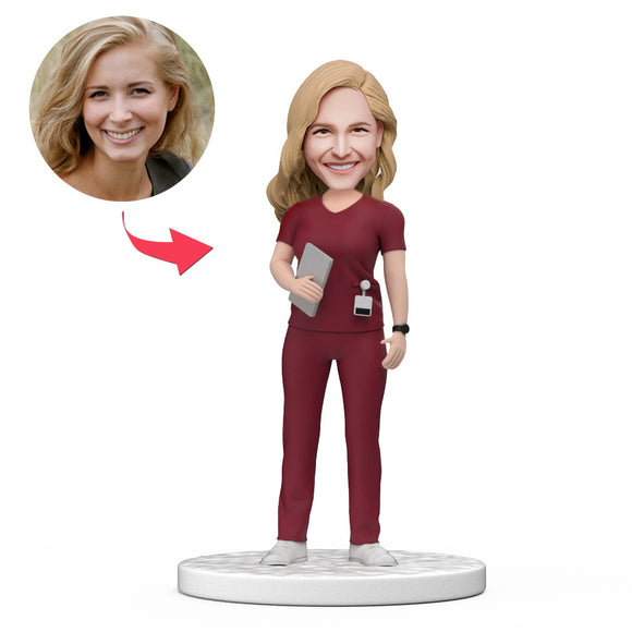 Custom Female Doctor Bobblehead in Red Holding a Tablet Scrubs with Engraved Text National Doctor's Day Gift