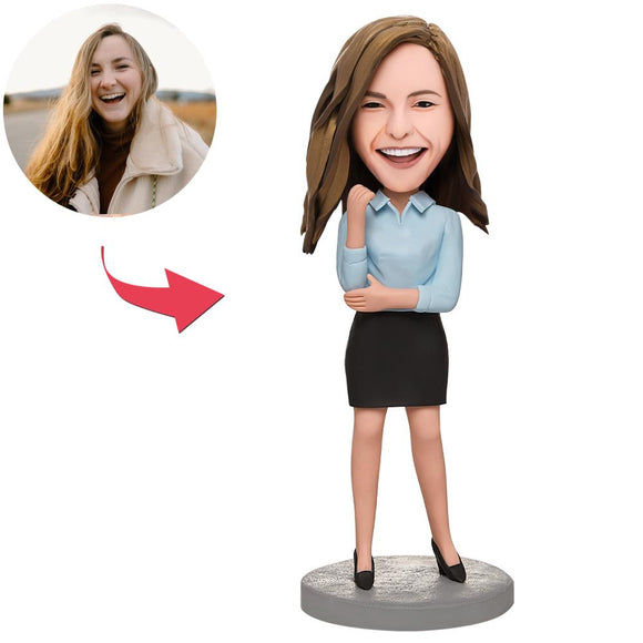 Businesswoman in a custom blue Bobblehead shirt with engraved text