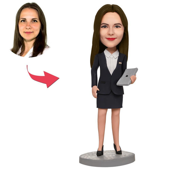 Businesswoman holding a custom Bobblehead laptop with text engraved